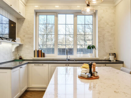 Feature image of Granite Countertops: Benefits and Styling Guide by QN Kitchens featuring a luxury granite kitchen.