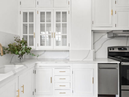 Feature image for How to Compare Kitchen Cabinets for Your Kitchen Renovation blog article with luxury white cabinets.